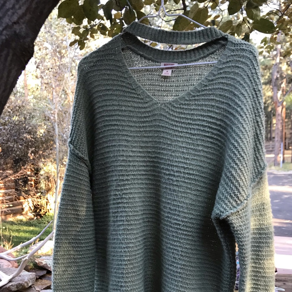 Sea foam green sweater with front cutout